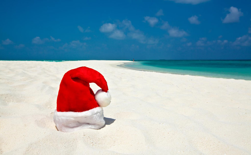 Chapeau de père Noel sur la plage